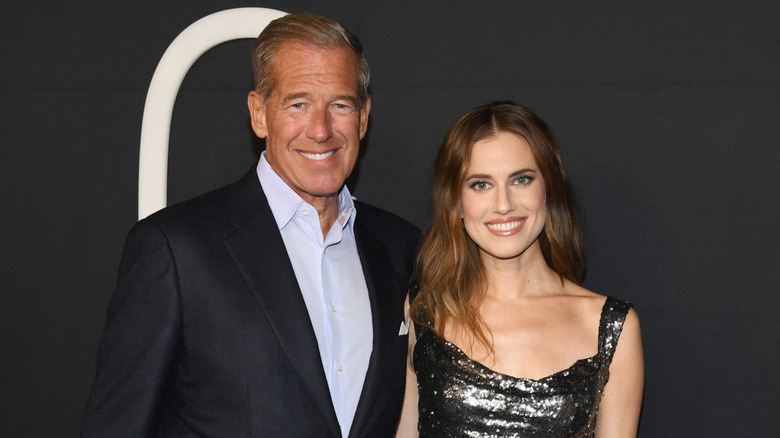 Brian Williams and Allison Williams smiling and posing for photo