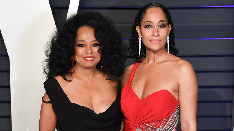 Diana Ross and Tracee Ellis Ross wearing dresses and posing for a photo