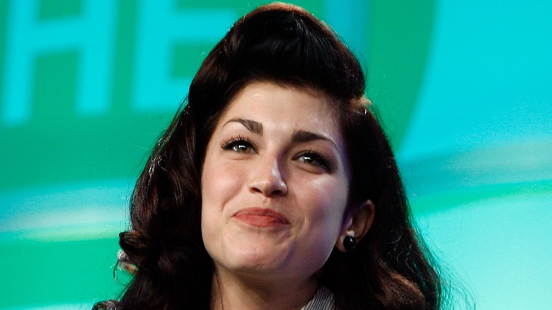 Stevie Ryan at press conference smiling