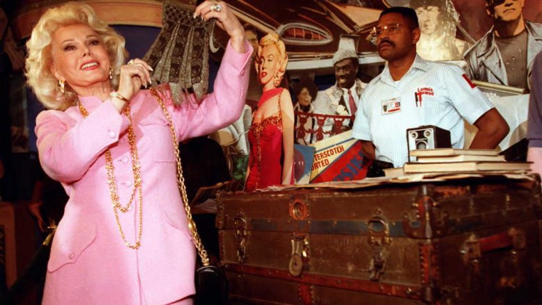 Zsa Zsa Gabor arms in air