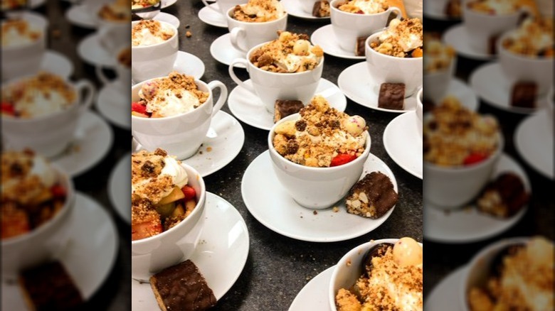 Desserts in cups lined up