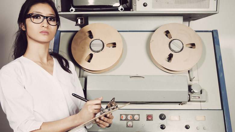 woman with a vintage computer