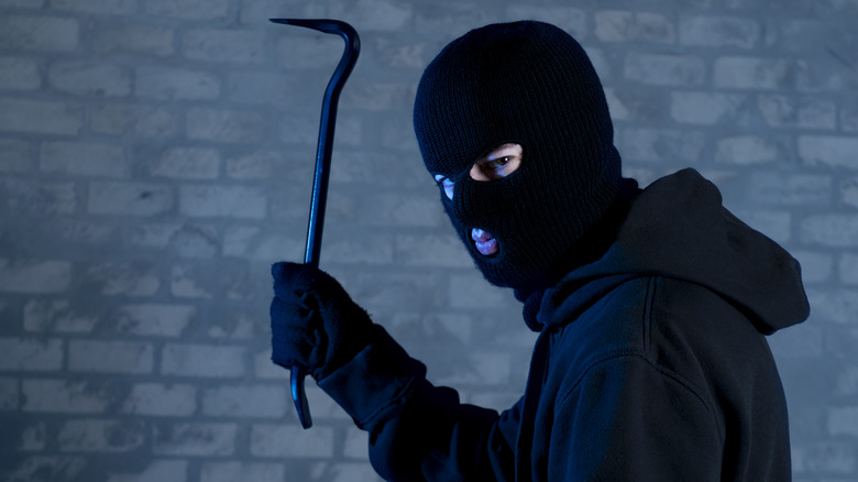 Burglar with a crowbar