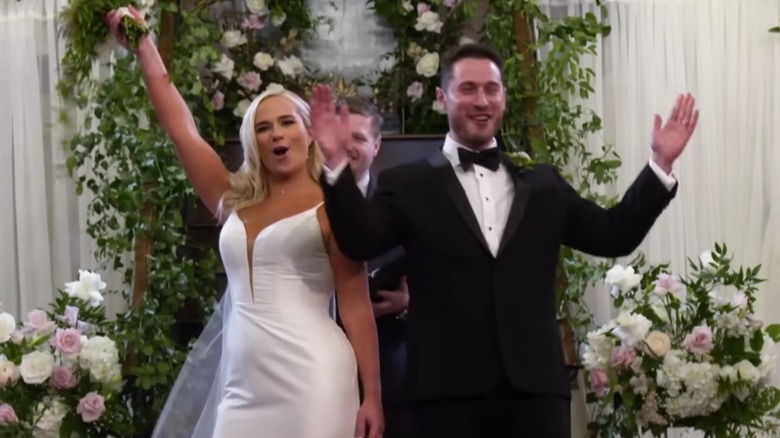 A bride and groom celebrating on Married at First Sight