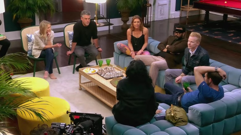 Participants sitting in a living room on Real World Homecoming: New Orleans