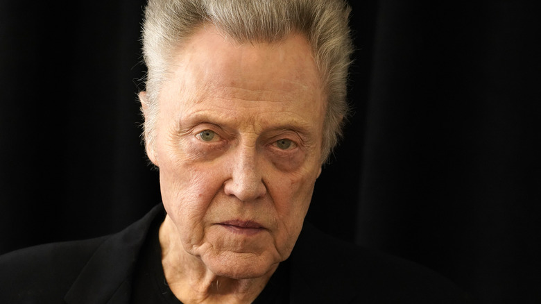 christopher walken neutral face black background