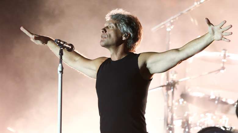 Jon Bon Jovi with his arms spread