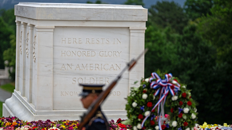 Guard walks by the Tomb