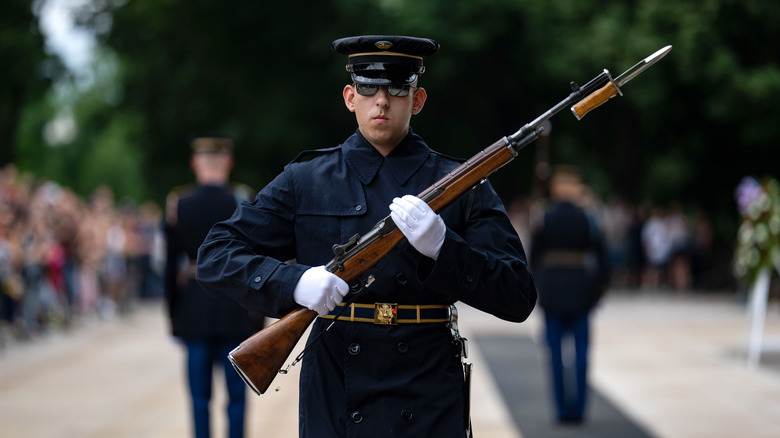 A Guard holding a rifle