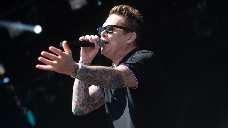 Mark McGrath performing on stage