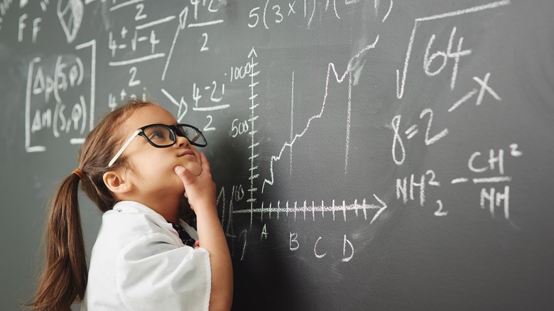 little girl doing math