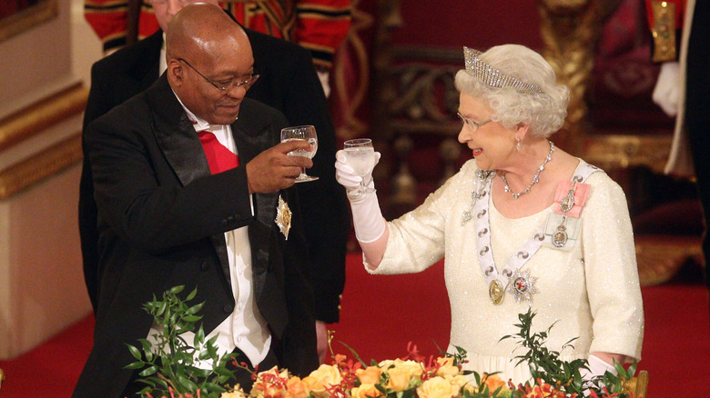 Jacob Zuma and Elizabeth II toast one another