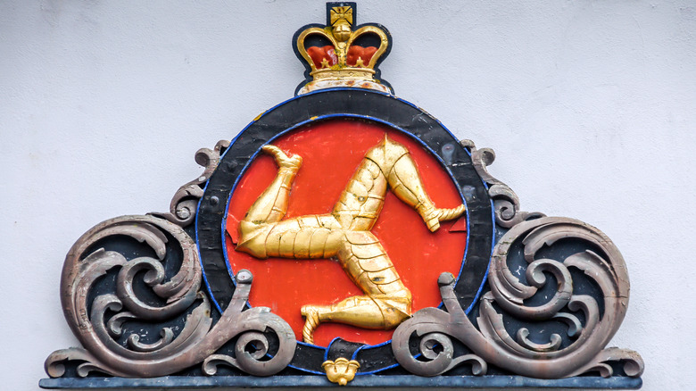 The three legs spin around in a badge of the Isle of Man