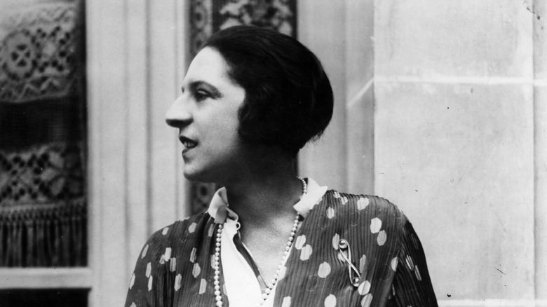 Suzanne Lenglen sitting and looking to the side