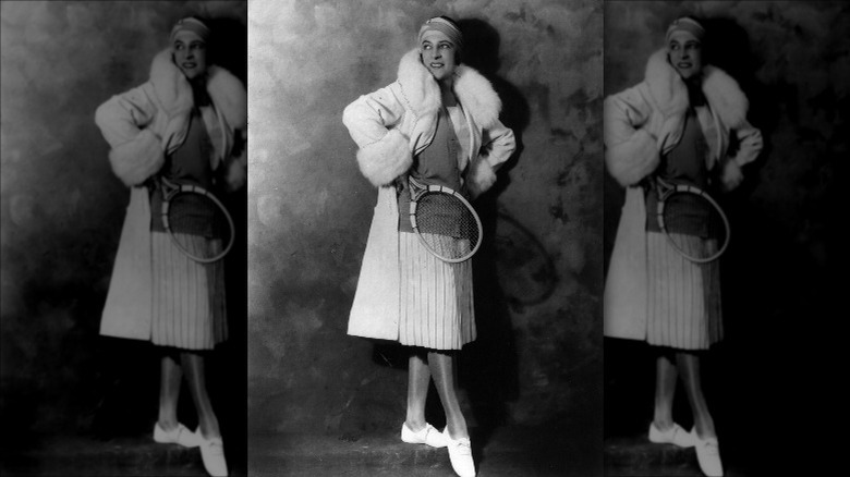 Suzanne Lenglen posing in a fashionable outfit