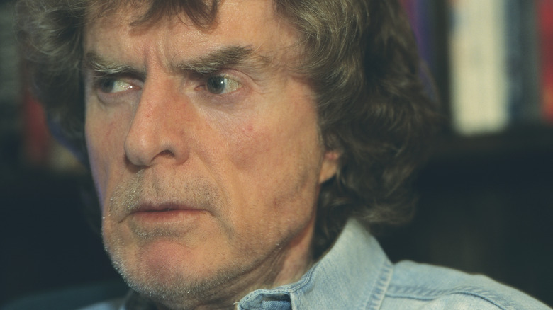 Don Imus fronting in denim shirt