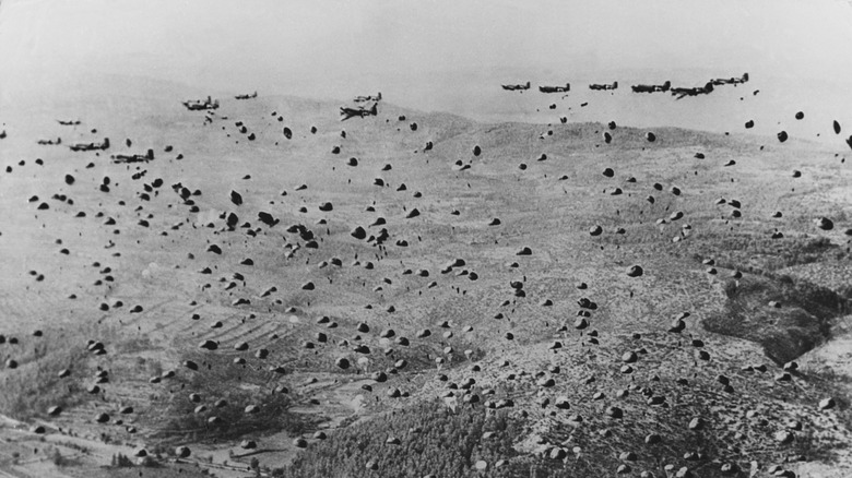 Hundreds of American paratroopers drop into Normandy, France on or near D-Day