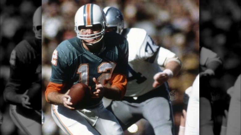 Bob Griese getting chased by defender