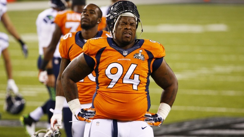 Terrence Knighton hands on hips, frowning