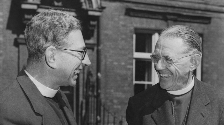 Ambrose Reeves (right), the Bishop of Johannesburg, with Canon John Collins