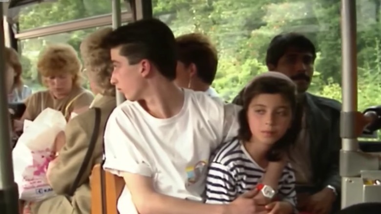 Emanuele di Giorgi with sister on bus