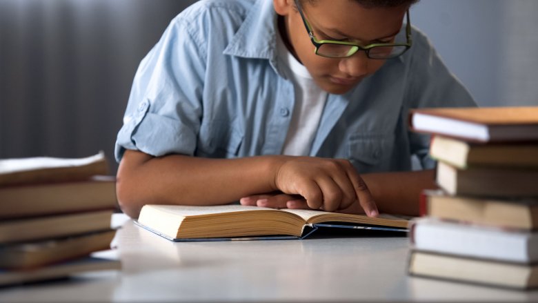 kid reading bookworm