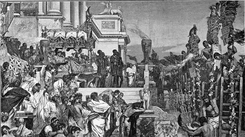 Emperor Nero watches as Christians are set alight