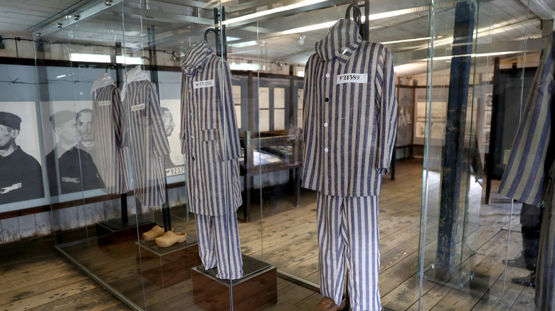 concentration camp prisoner uniforms on display