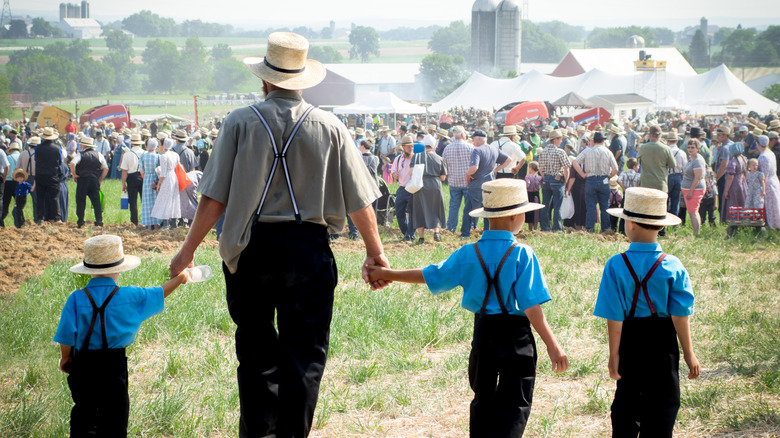 Amish man and three boys