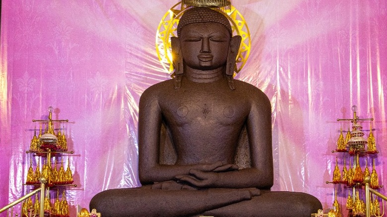 Lord Adinatha statue pink background