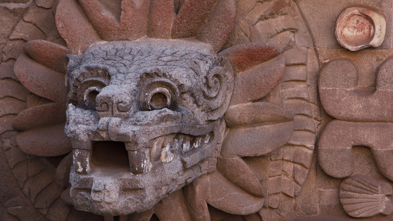 Quetzalcoatl stone statue