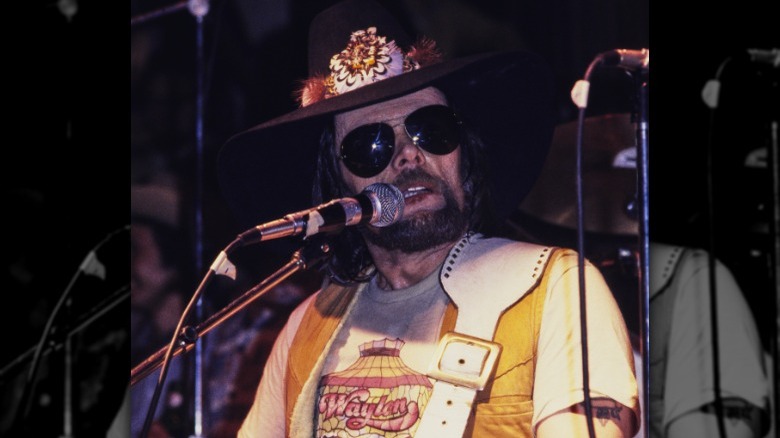 Johnny Paycheck singing onstage