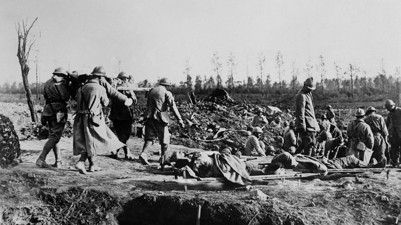 overpopulated trench with stretchers in WWI