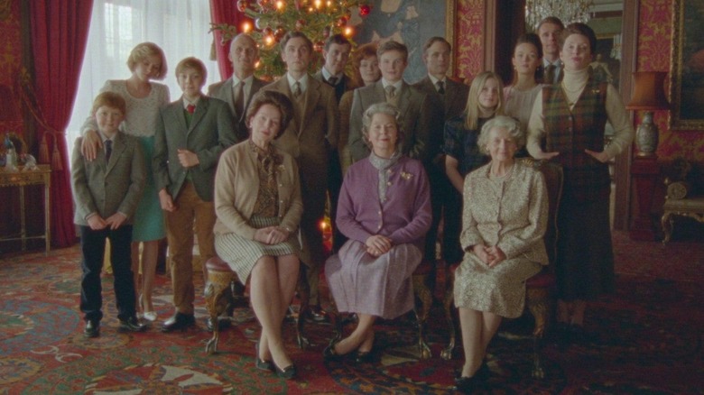 Elizabeth II (Stella Gonet) and family in front of tree