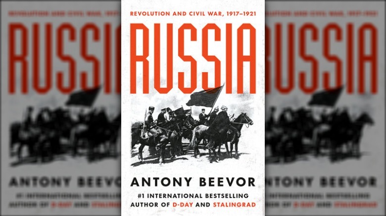 Cover of Russia by Antony Beevor with imposing red lettering and men on horseback with weapons and flags