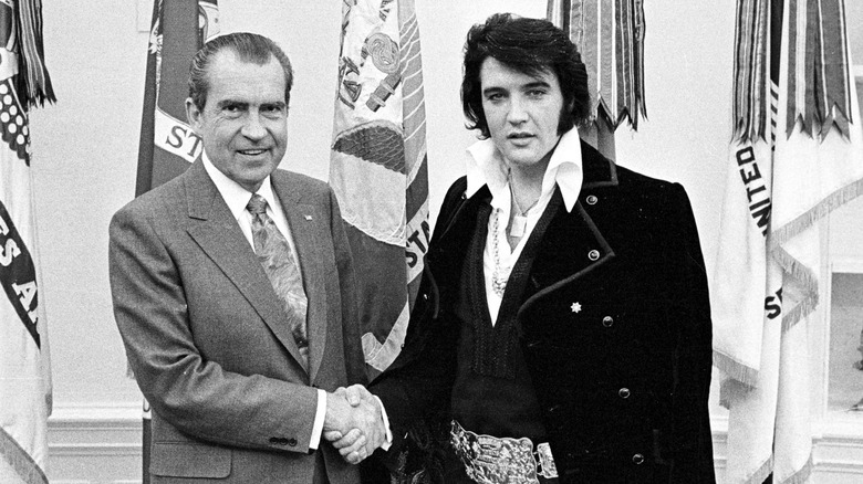 President Nixon shakes Elvis Presley's hand in the photo that inspired two movies