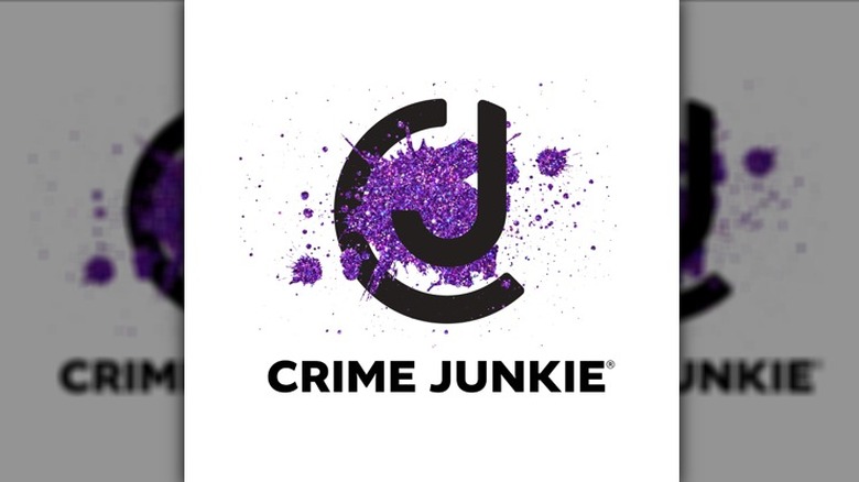 Crime Junkie podcast cover "CJ" purple splatter on white