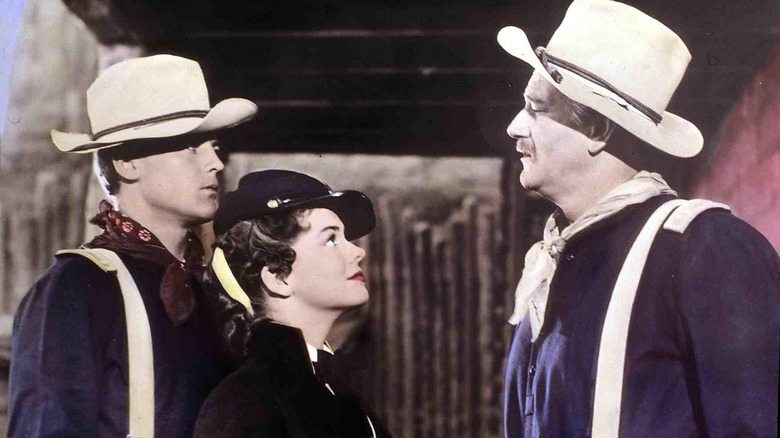 John Agar, Joanne Dru and John Wayne in "She Wore a Yellow Ribbon"