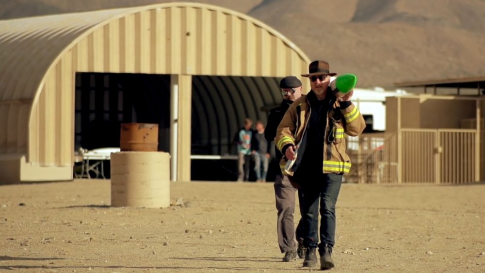 Adam and Jamie carrying a rocket