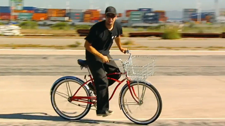 Tory Belleci riding bike