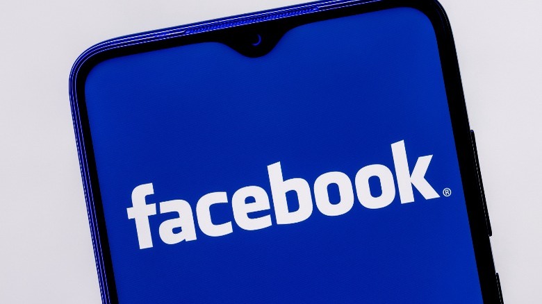 Facebook logo on smartphone