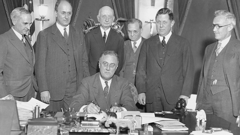 FDR signs Dollar Devaluation Bill