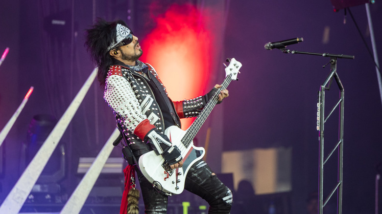 Nikki Sixx playing bass