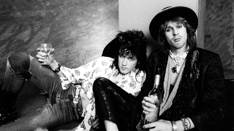 Razzle and Michael Monroe drinking on the floor