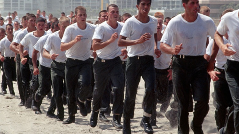 Recruits running on beach