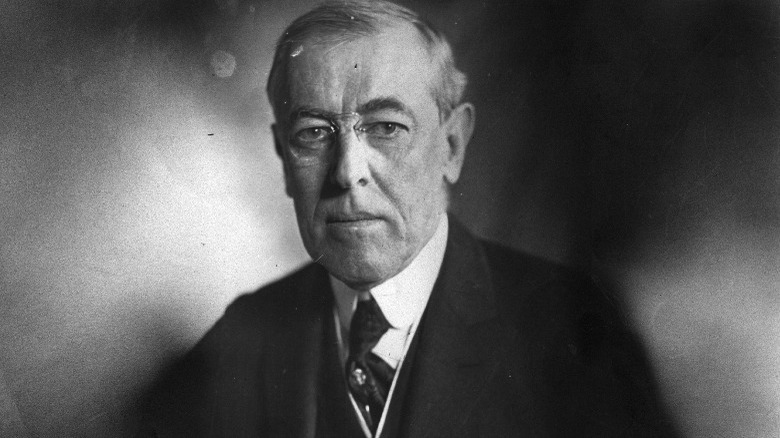 Woodrow Wilson sitting stoically