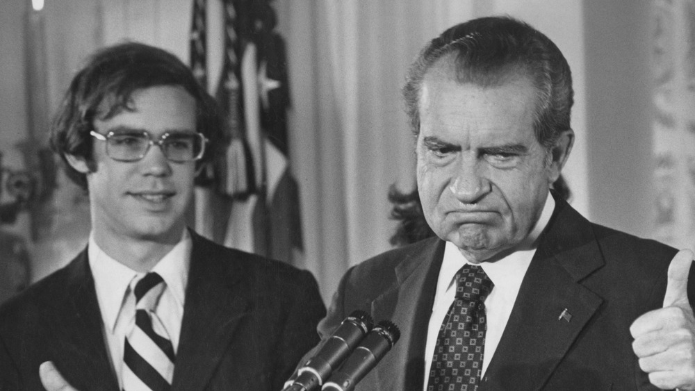 David Eisenhower and Richard Nixon in front of microphones