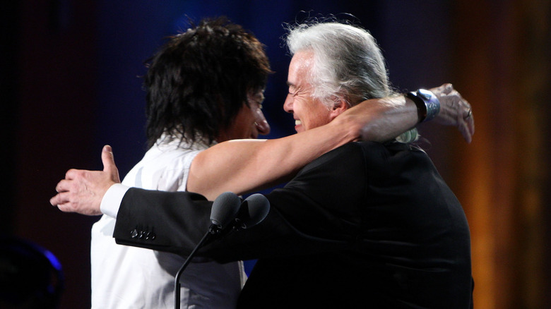 Jimmy Page and Jeff Beck embrace