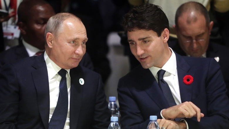 Vladimir Putin with Justin Trudeau at the Paris Peace Forum, 2018