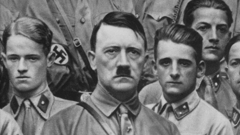 Adolf Hitler posing with Nazi soldiers